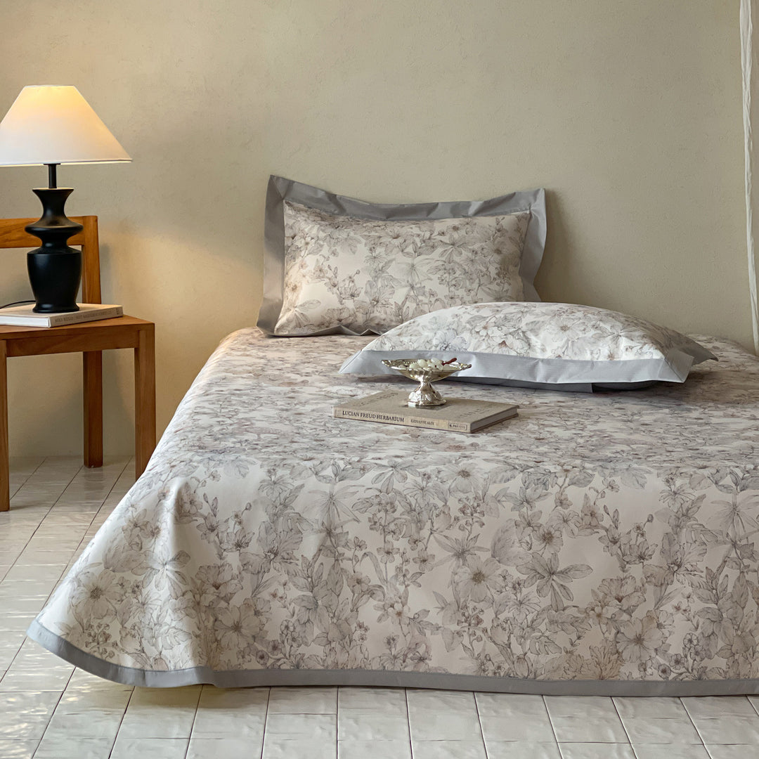 Luxurious satin bed linen set with floral jacquard weaving and wide satin border