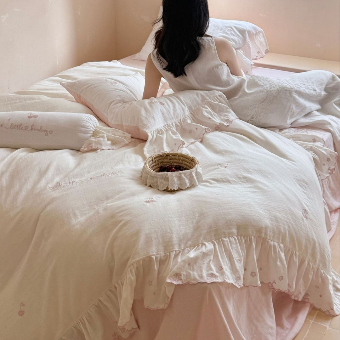Romantic cotton bedding set with ruffles and delicate embroidery
