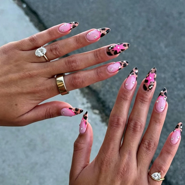 Nail set with glamorous leopard design and glitter elements Stornfield