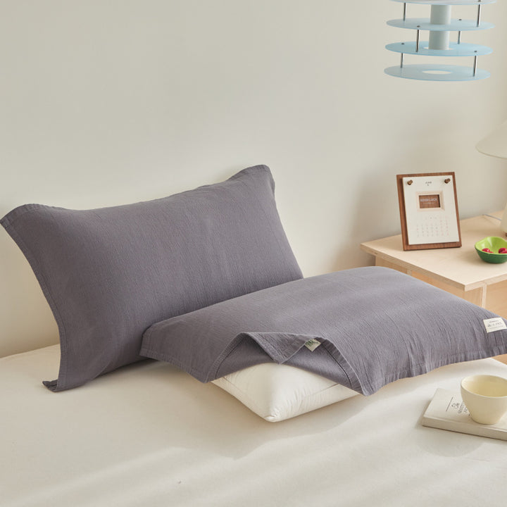 Textured cushion cover set made of cotton-linen blend with waffle structure