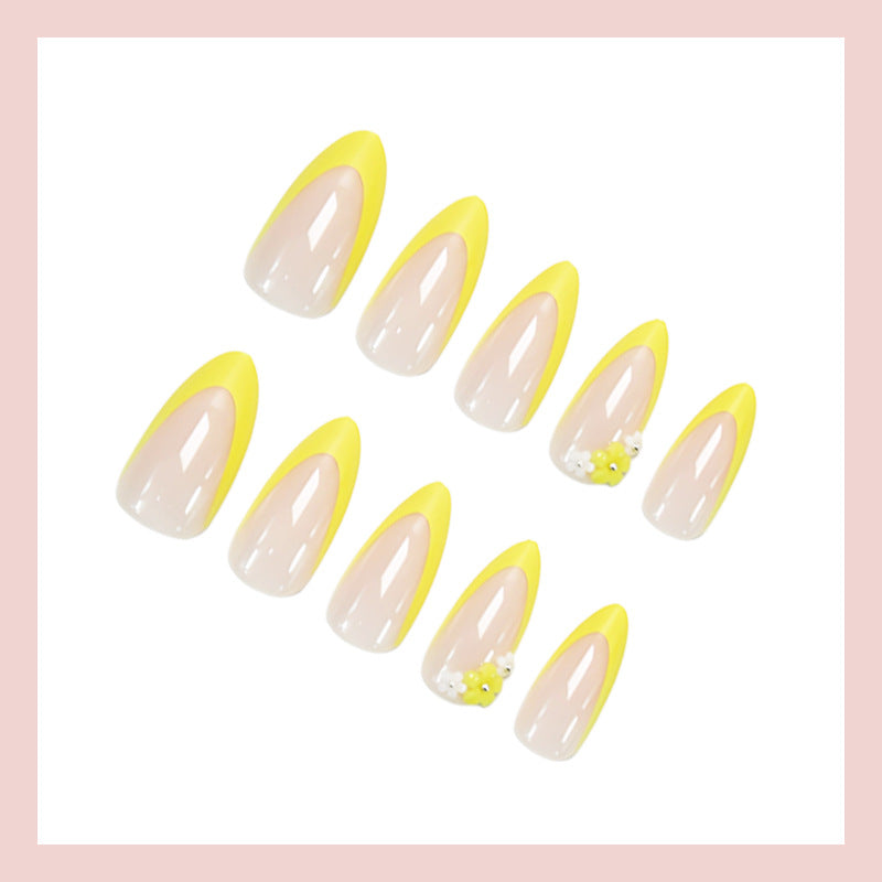 Artificial nail set with elegant gradient and floral accents Stornfield