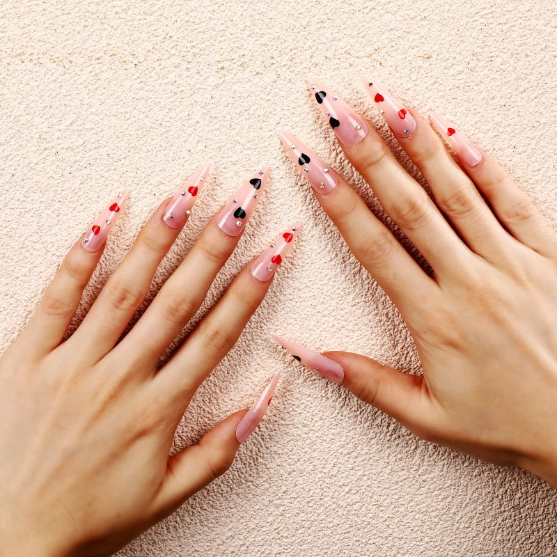 Glamorous artificial nails with heart accents Stornfield