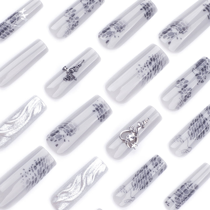 Artful Nail Extensions with Noble Accents Stornfield