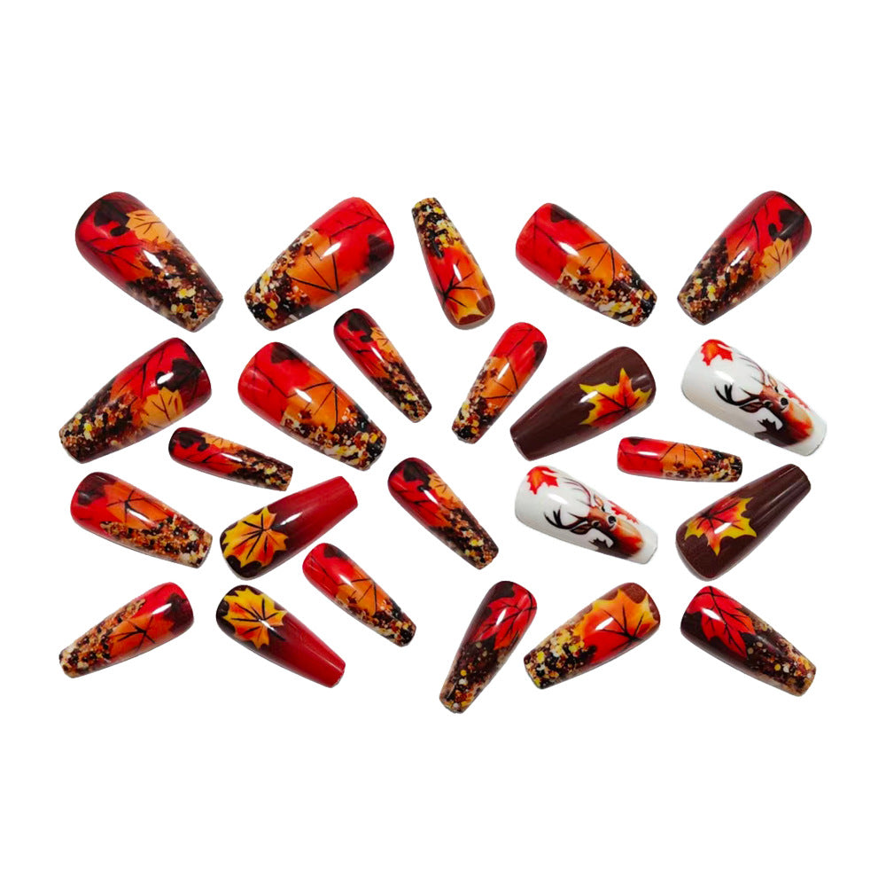 Artificial nail art with autumn leaf design Stornfield