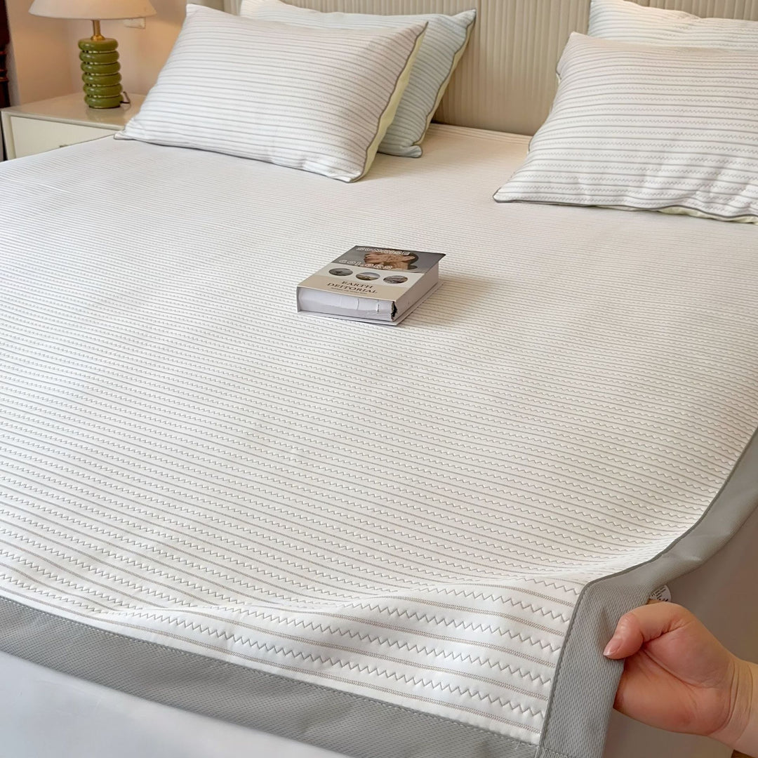 Water-repellent quilted mattress protector with elastic all-around cover