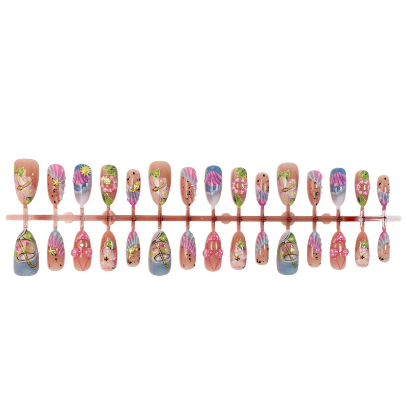 Artificial nail set with botanical designs and glamorous accents Stornfield