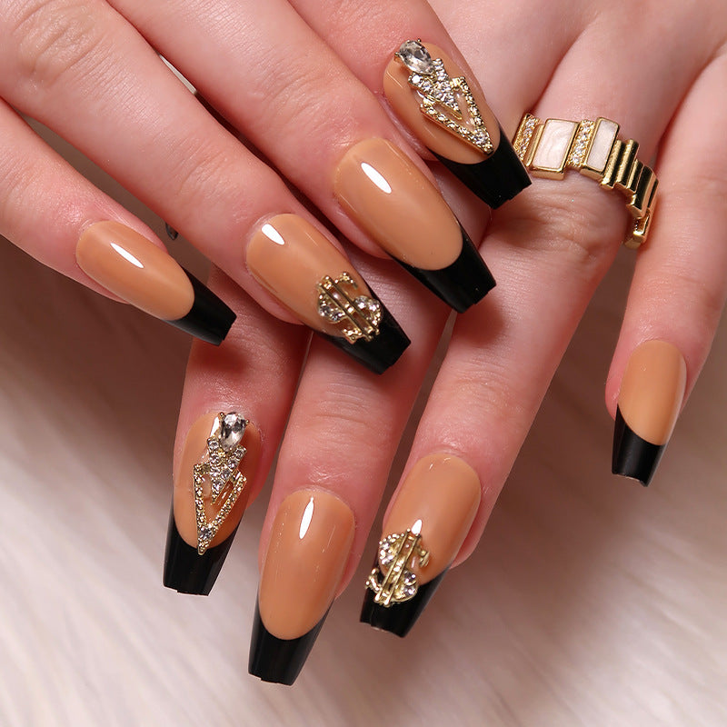 Glamorous artificial nails with rhinestones and black tips Stornfield