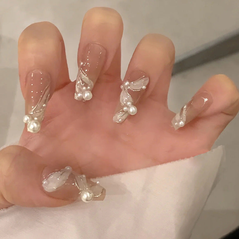 Artful Nail Art with Glitter and Butterfly Elements Stornfield