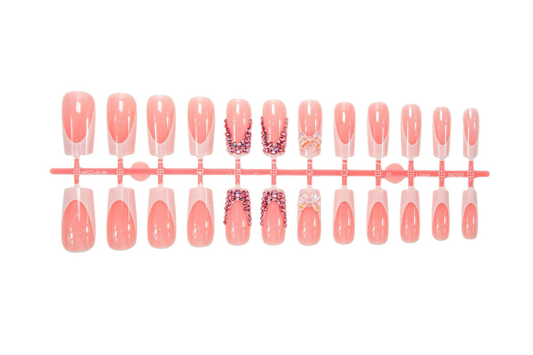 Artificial nail set with elegant glitter accents and modern designs Stornfield