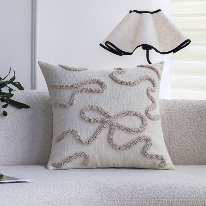 Square decorative cushion cover with hand-tufted bow and wave relief made of cotton-linen mix Stornfield