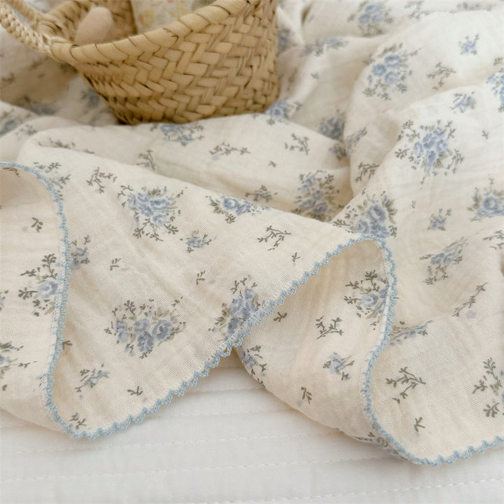 Unisex Muslin Blanket with delicate floral design and elegant ruffles Stornfield