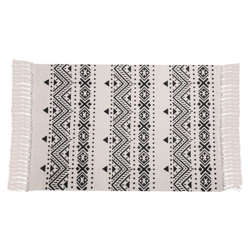 Flat-woven cotton runner with Mediterranean tile jacquard and decorative fringes Stornfield