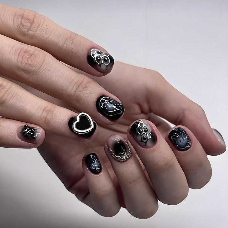 Acrylic nail set with creative black-and-white patterns Stornfield