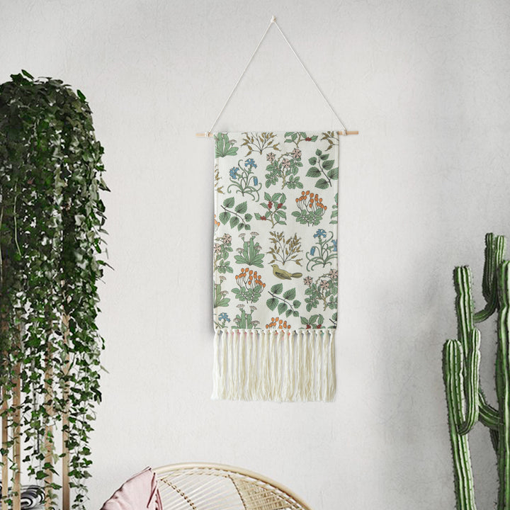 Woven wall hanging with floral jacquard structure and long fringes Stornfield