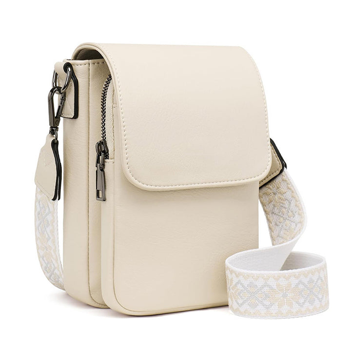 Small crossbody bag with decorative shoulder strap Stornfield