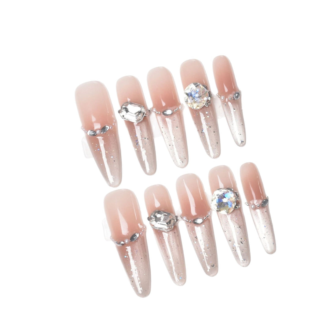Artistic Stiletto Press-On Nail Art with Glimmering Accents Stornfield
