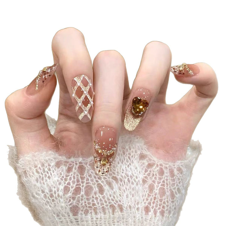 Artificial nails with glamorous rhinestone decorations Stornfield