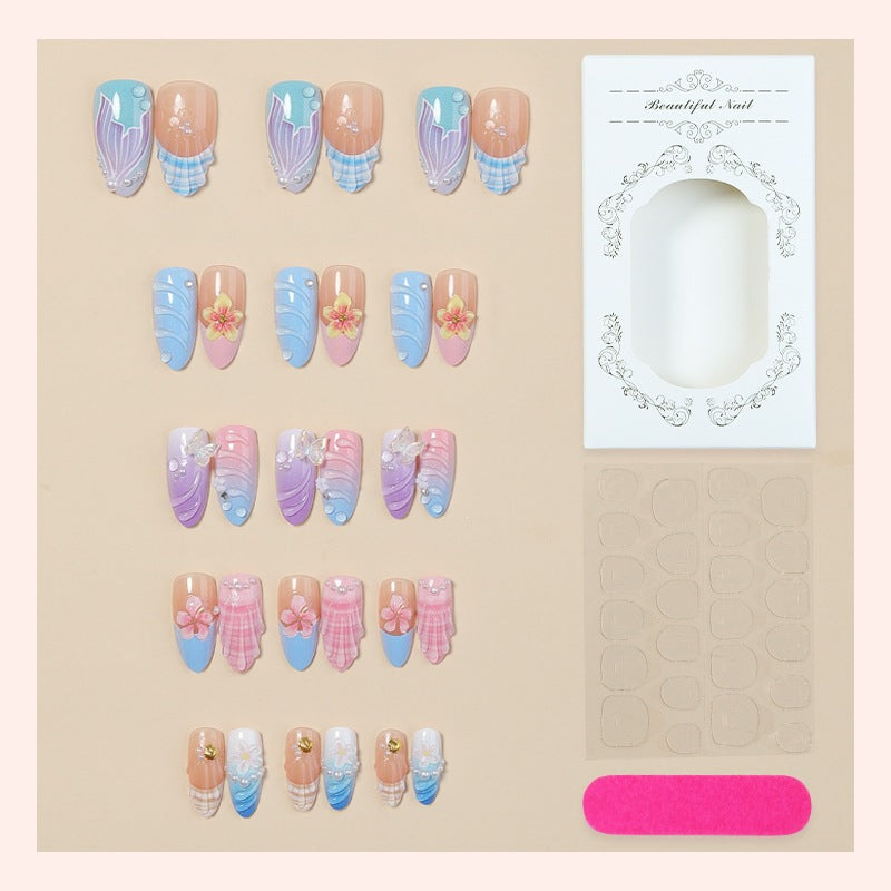 Creative nail art set with floral and colorful accents Stornfield