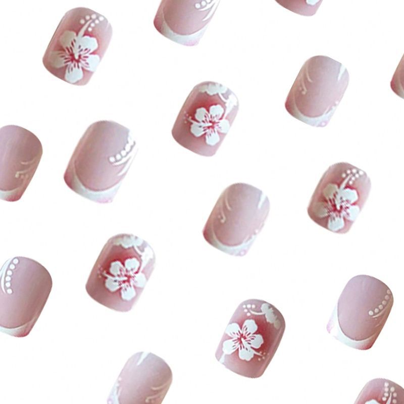 Acrylic nail set with elegant flower and French tip designs Stornfield