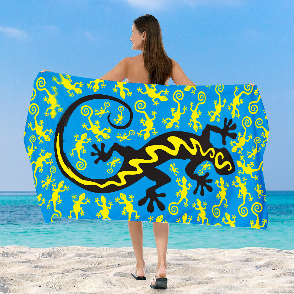 Beach towel with vibrant, colorful animal motif Stornfield
