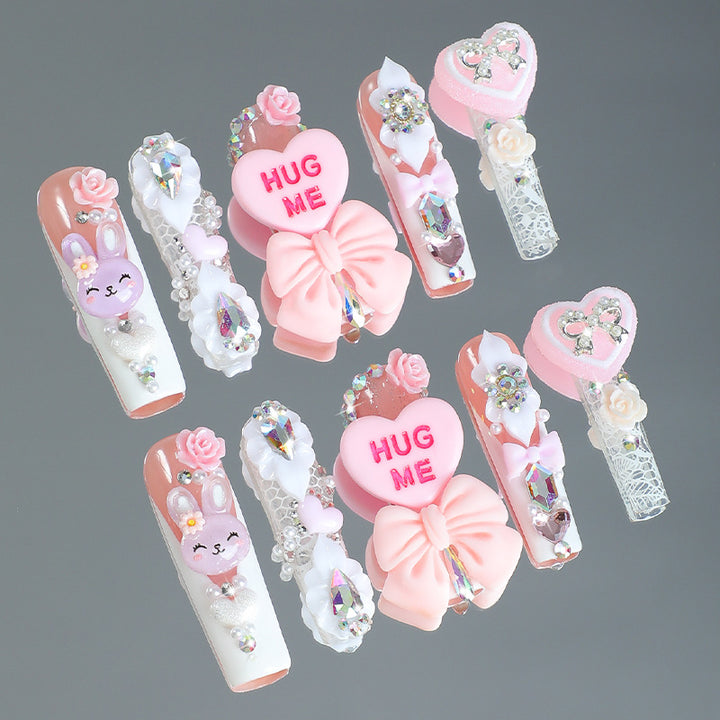 Creative nail art set with playful animal and heart motifs Stornfield