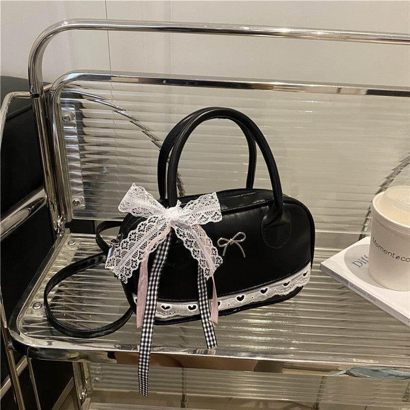 Elegant Lace-Trimmed Bow Handbag Stornfield