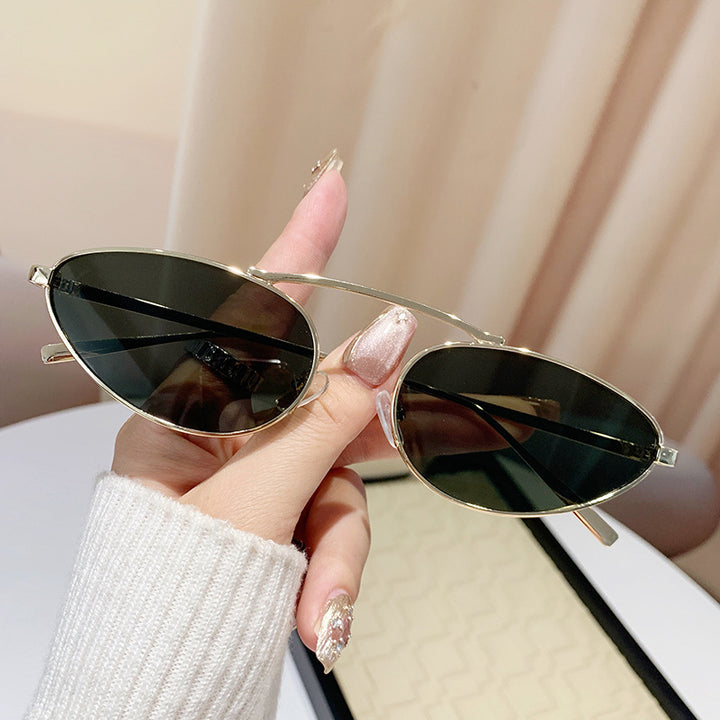 Ladies fashionable sunglasses in elegant oval design Stornfield