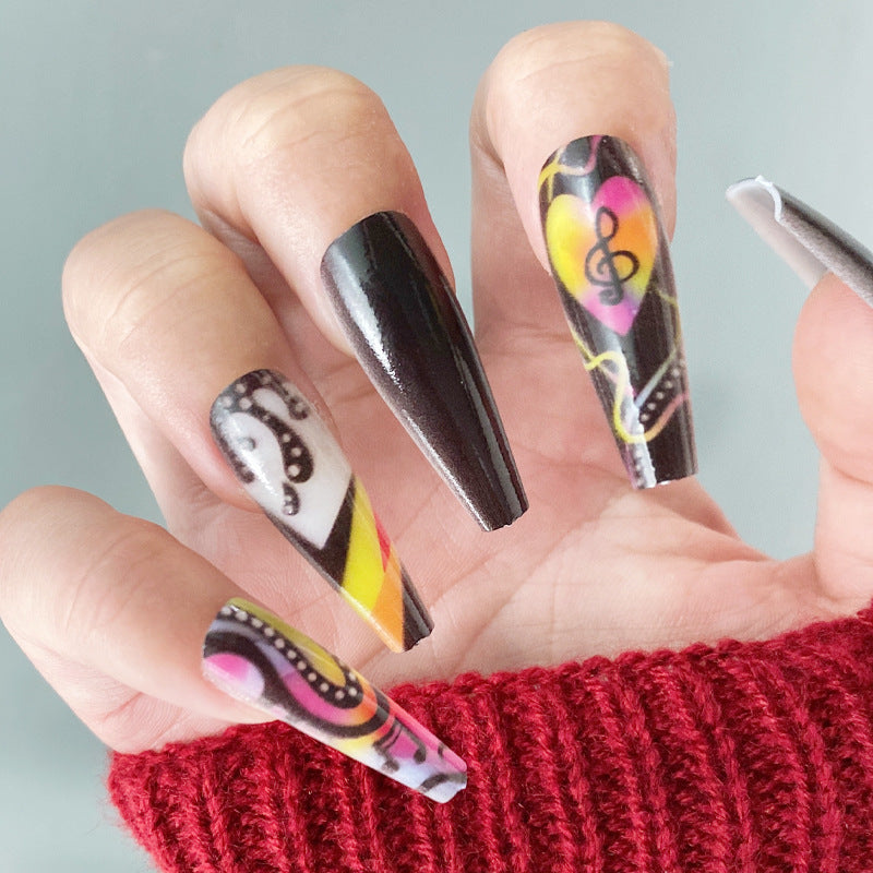 Artistic Music-Themed Nail Art Stornfield