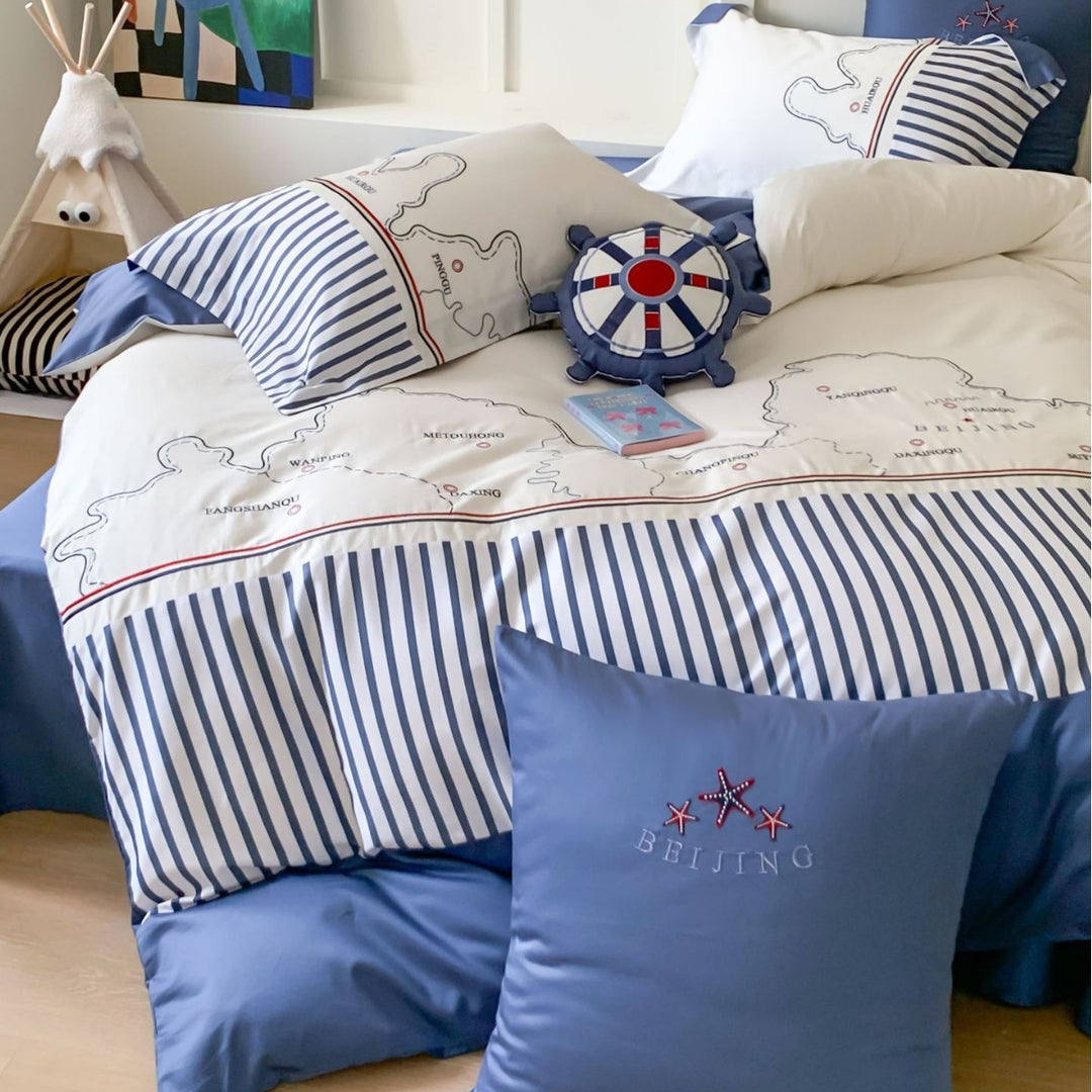 Maritime children's duvet cover set with cartographic print, fine striped border and pillowcases