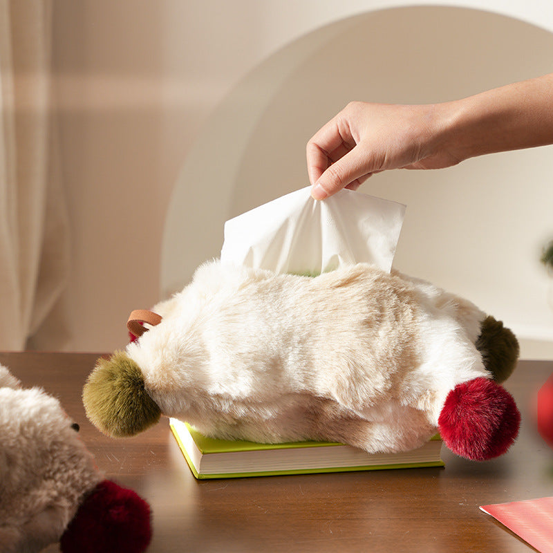 Handy tissue storage made of faux fur with leather handle and pompom