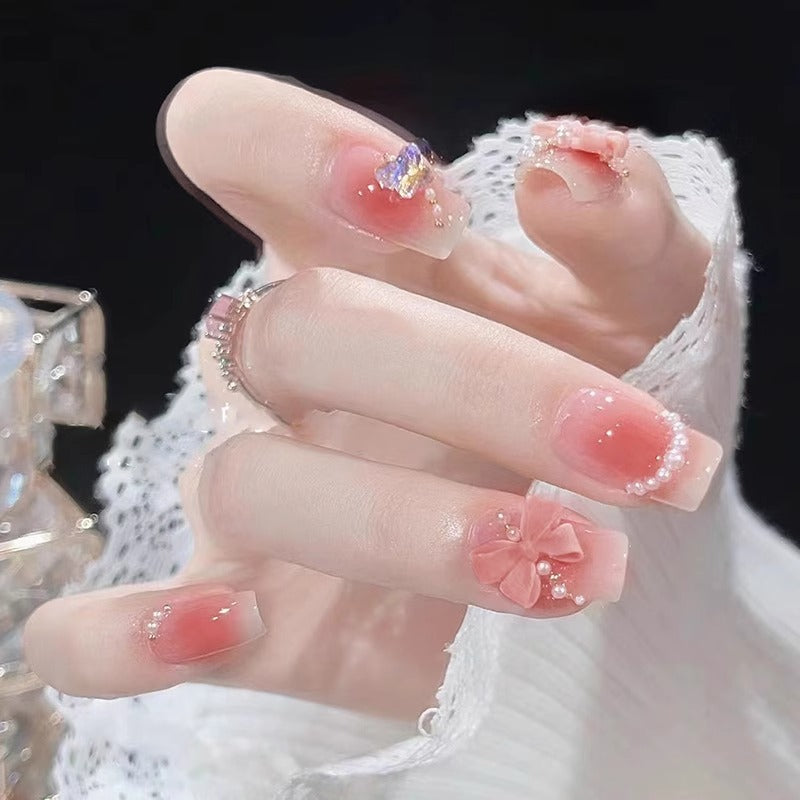 Artificial nails with perforated flower pattern Stornfield
