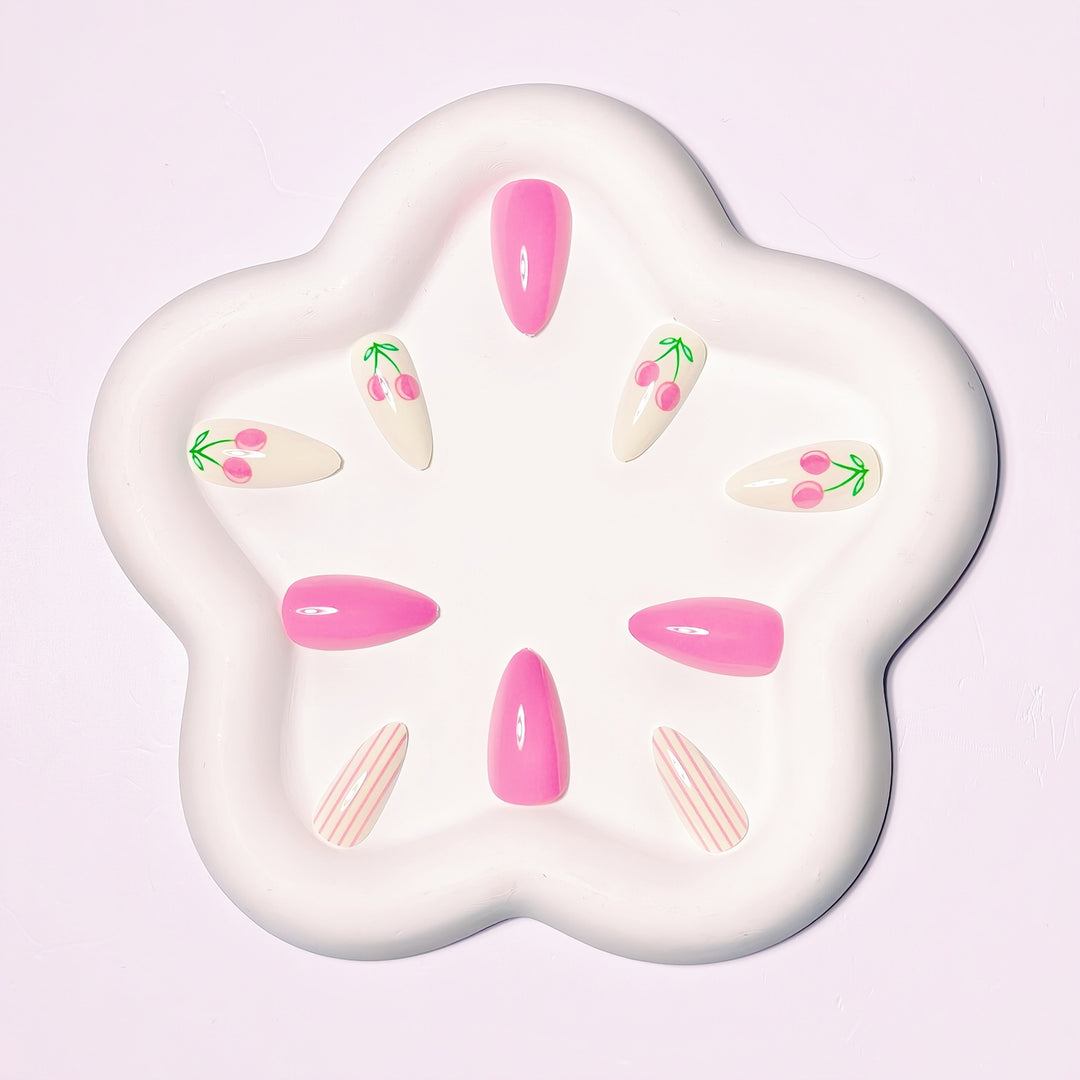 Artificial nails with fruity cherry design and striking colors Stornfield