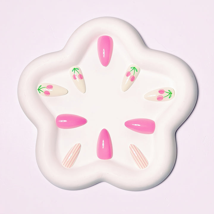 Artificial nails with fruity cherry design and striking colors Stornfield