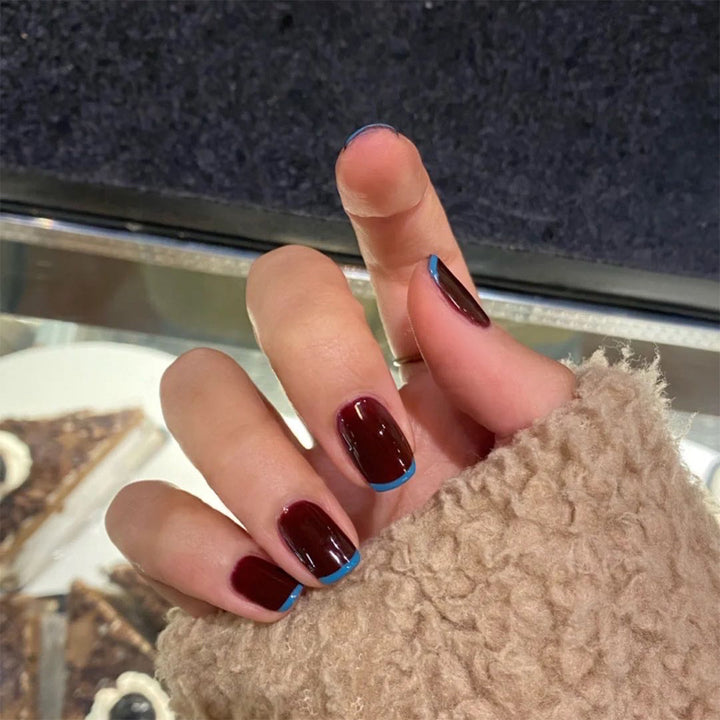 Artful nail extensions with an elegant leaf pattern Stornfield