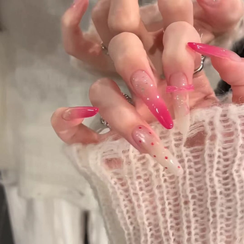 Artistic Gradient Nail Extensions with Decorative Accents