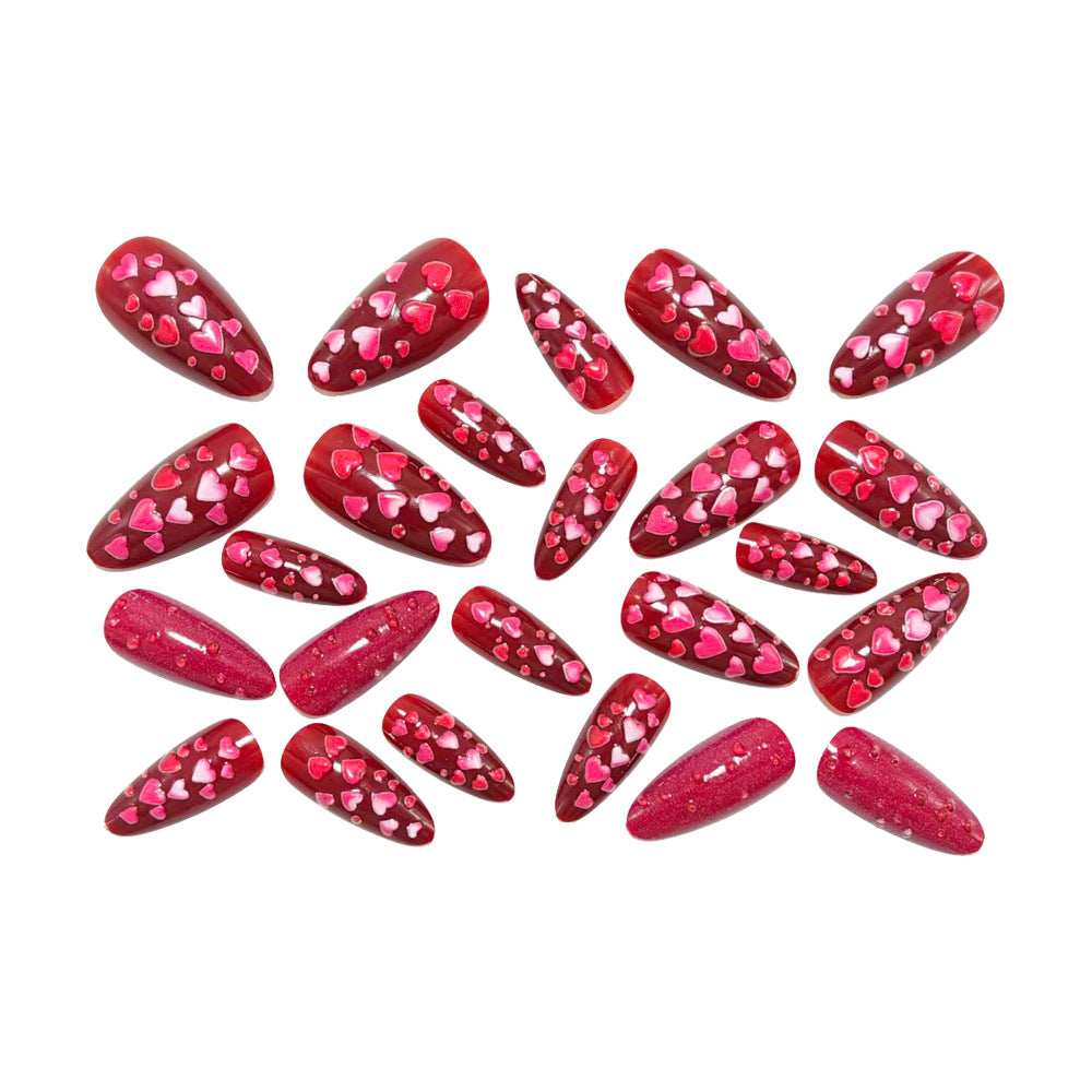 Artificial nails with heart motif and glitter effects Stornfield