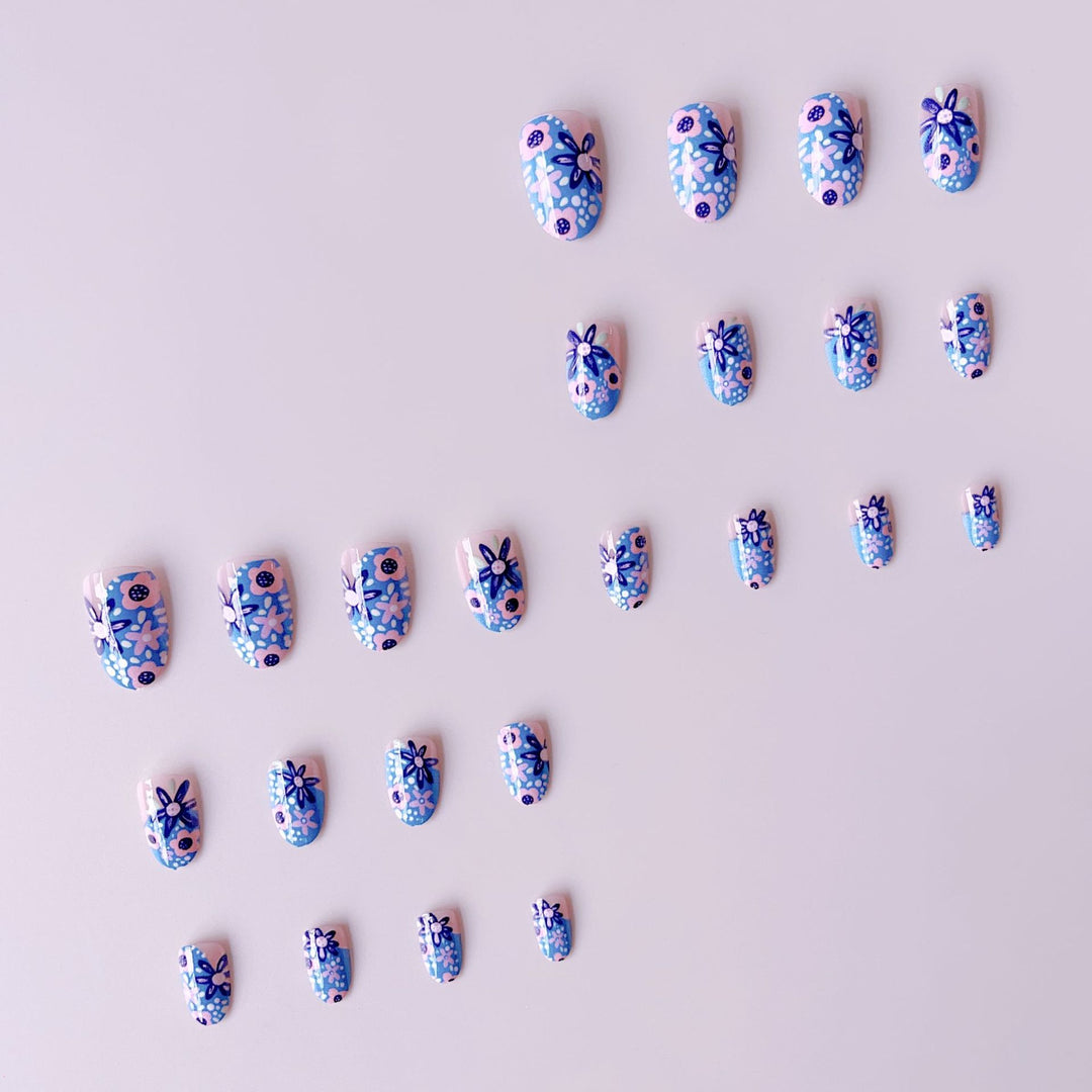 Nail art set with floral accents and vibrant patterns Stornfield