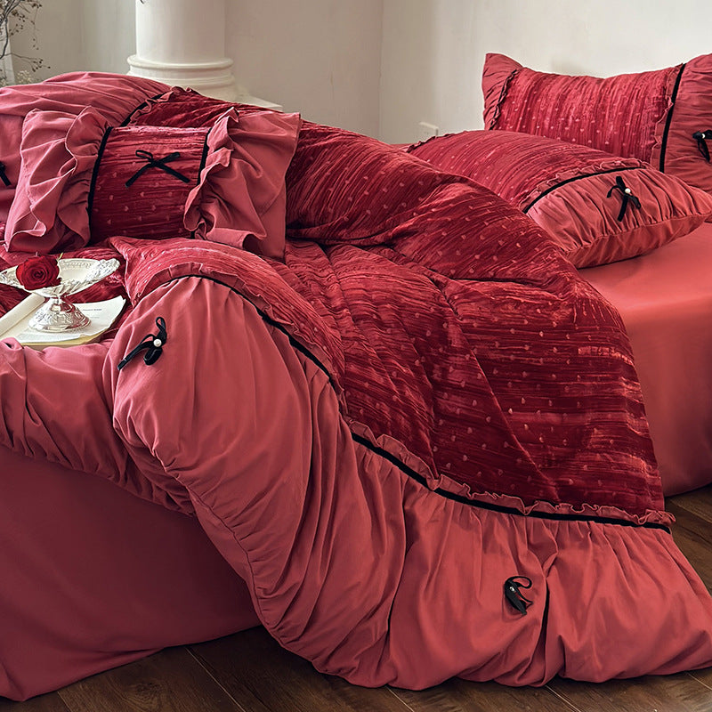 Bedding set made of velvety microfiber with ruffles, decorative ribbons, and quilted texture