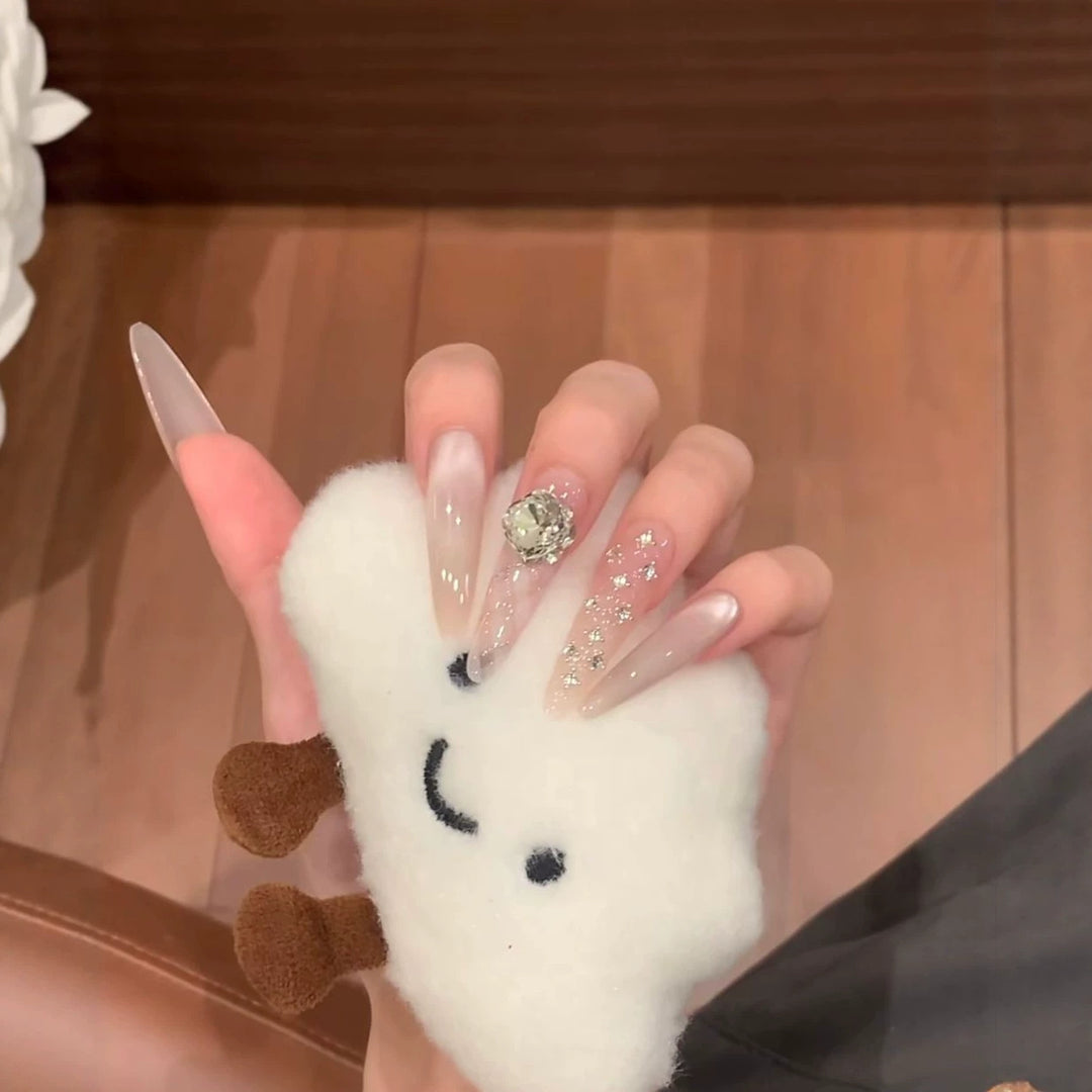 Glamorous Stiletto Nail Extensions with Glitter Accents