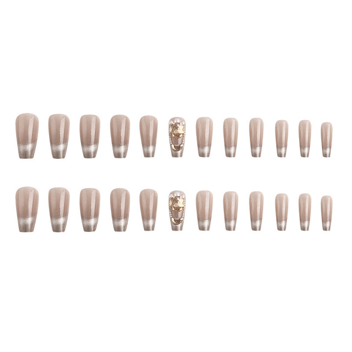 Artificial nail set with glamorous gold and glitter accents Stornfield