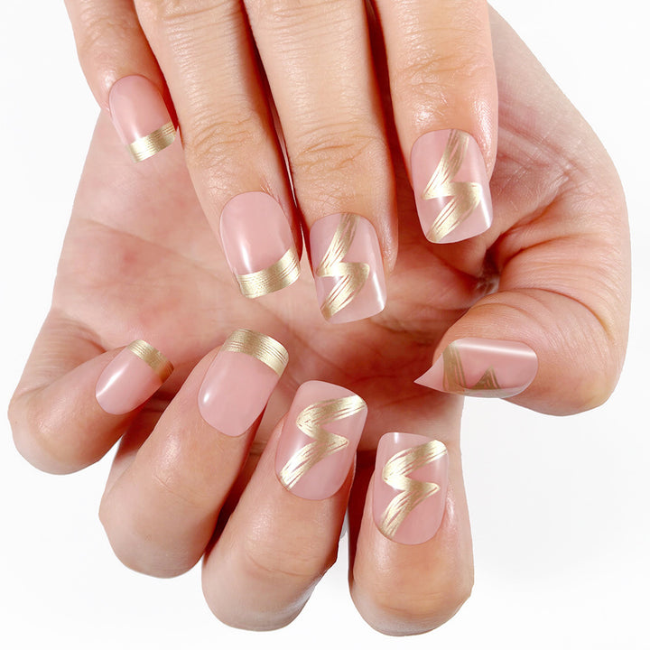 Elegant French Tip Press-On Nails with Gold Accents Stornfield