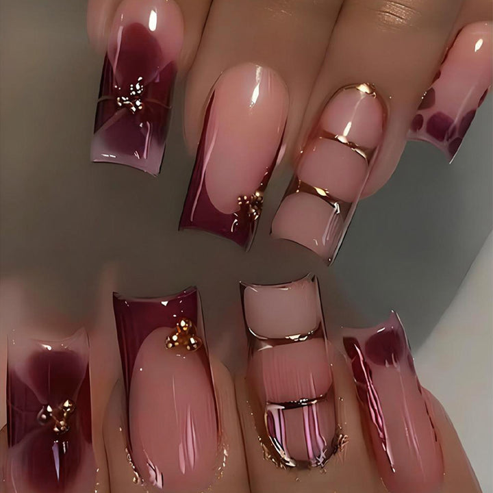 Artificial nail set with elegant gradient and delicate decorations Stornfield