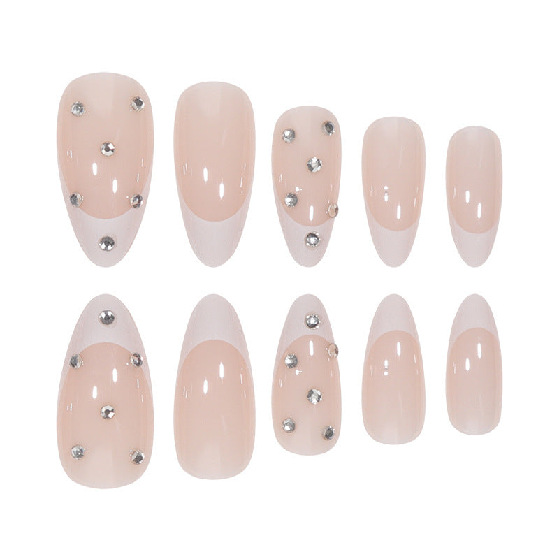 Elegant Stiletto Nail Extensions with Rhinestone Accents Stornfield