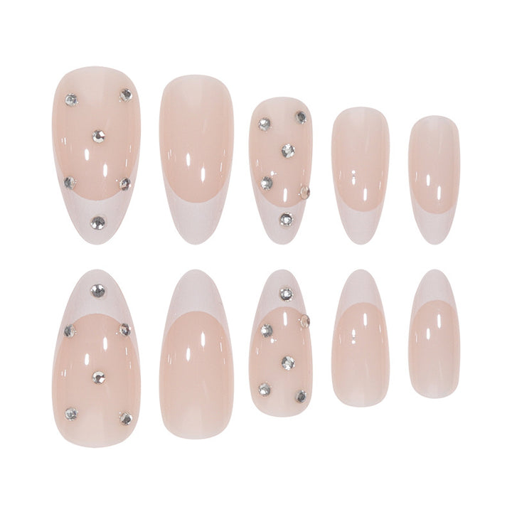 Elegant Stiletto Nail Extensions with Rhinestone Accents Stornfield