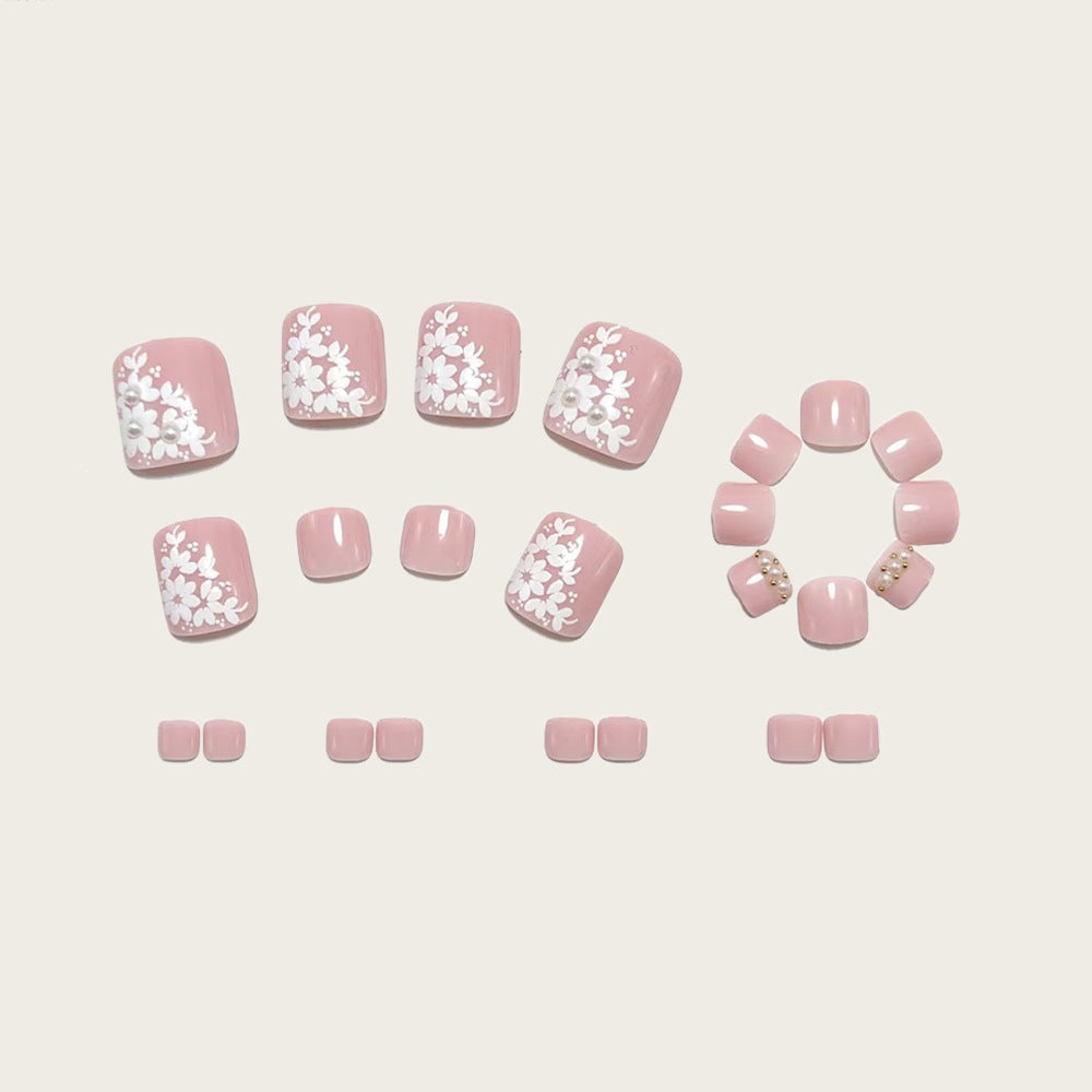 Artificial nails with delicate flower design and elegant accents Stornfield