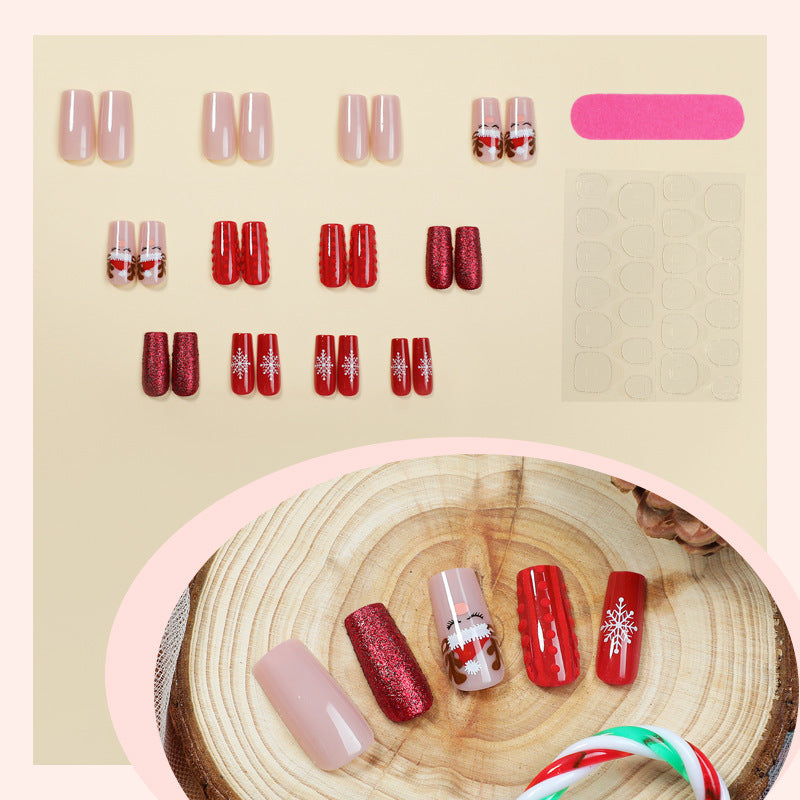 Artificial nail set with festive Christmas designs and glitter accents Stornfield