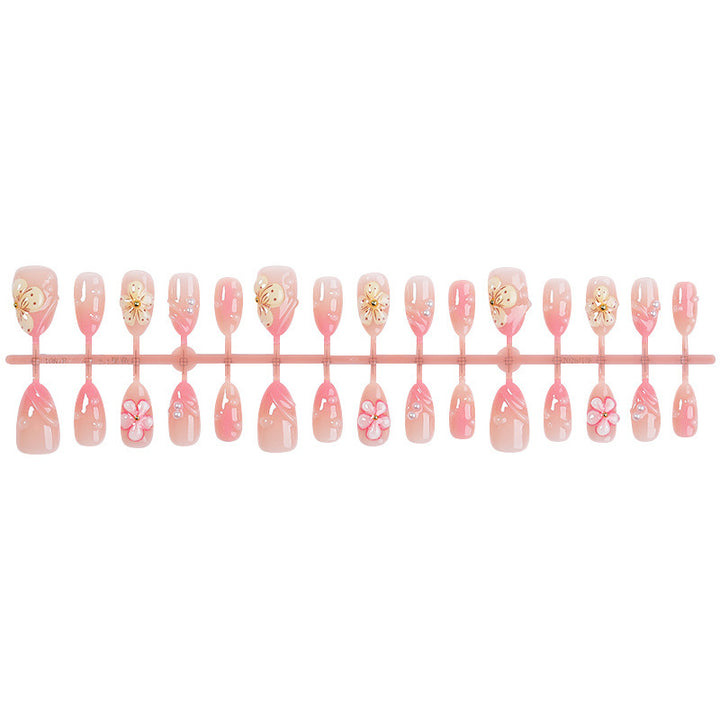 Acrylic nail set with creative floral accents Stornfield
