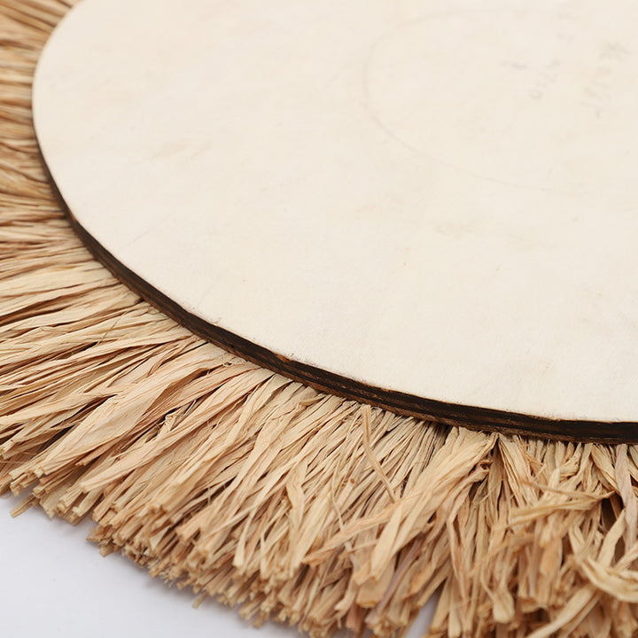 Decorative wall mirror with natural rattan frame Stornfield