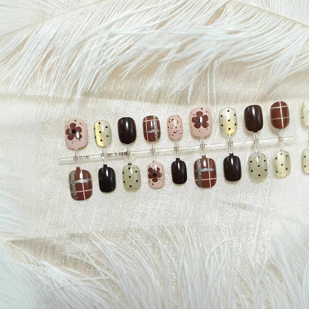 Artificial nails with floral and glittering design Stornfield