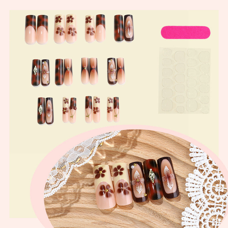 Nail set with floral accents and glitter accents Stornfield